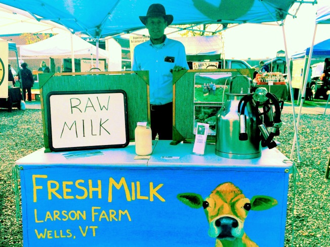 Rich Larson selling milk at the farmers market. Larson Farm/photo